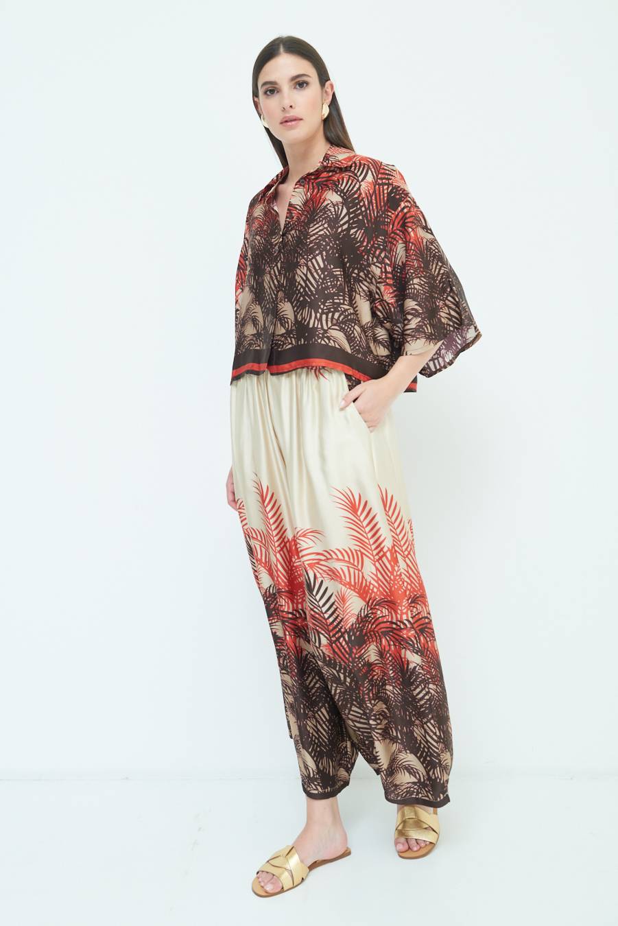 Kikisix PANTALONE PALAZZO FANTASIA BALZA MORO/ARANCIO Bestseller