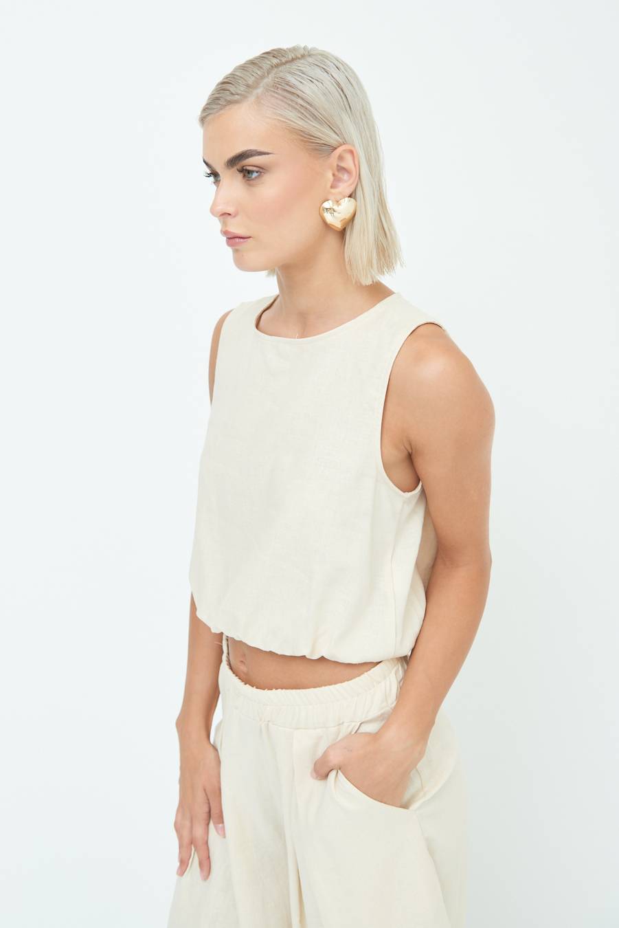 Kikisix TOP CORTO CON ELASTICO NATURALE Sconto