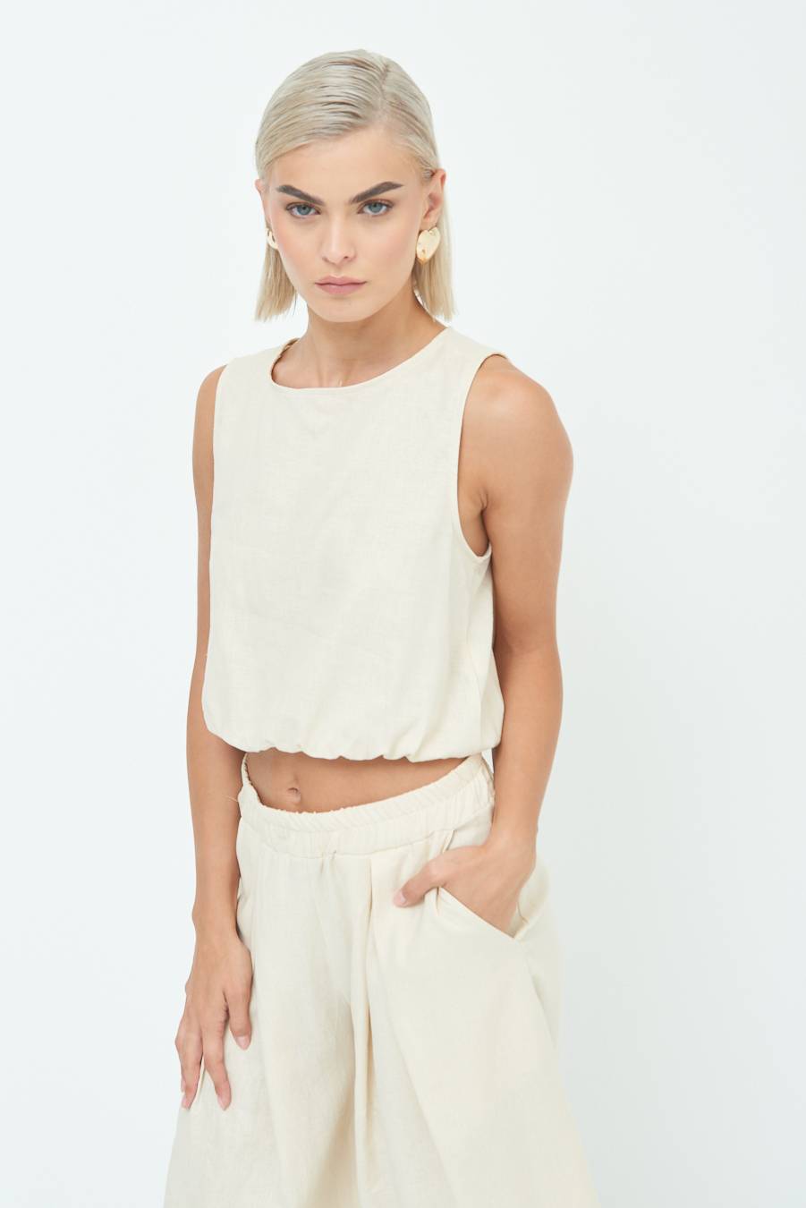 Kikisix TOP CORTO CON ELASTICO NATURALE Sconto
