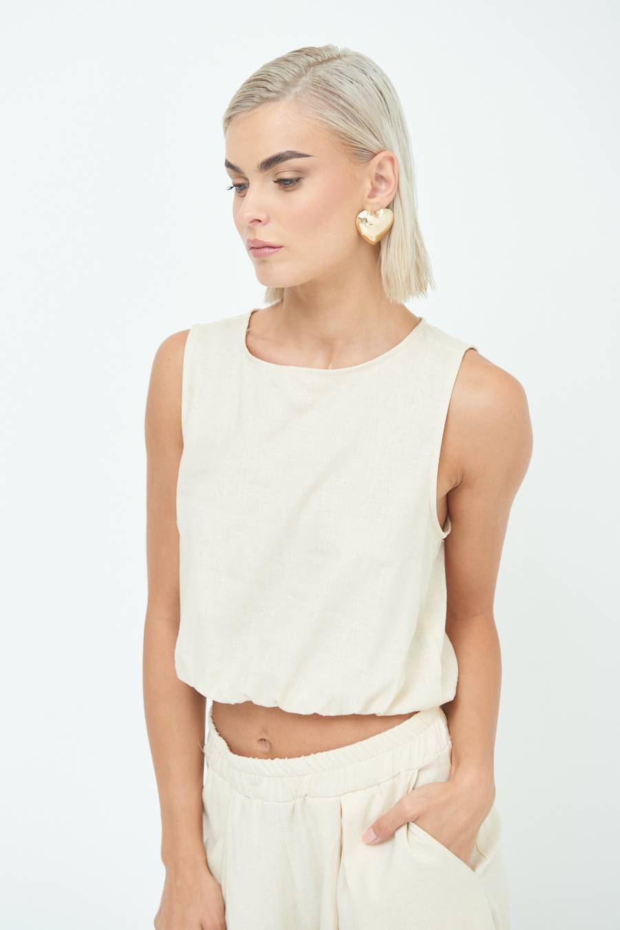 Kikisix TOP CORTO CON ELASTICO NATURALE Sconto