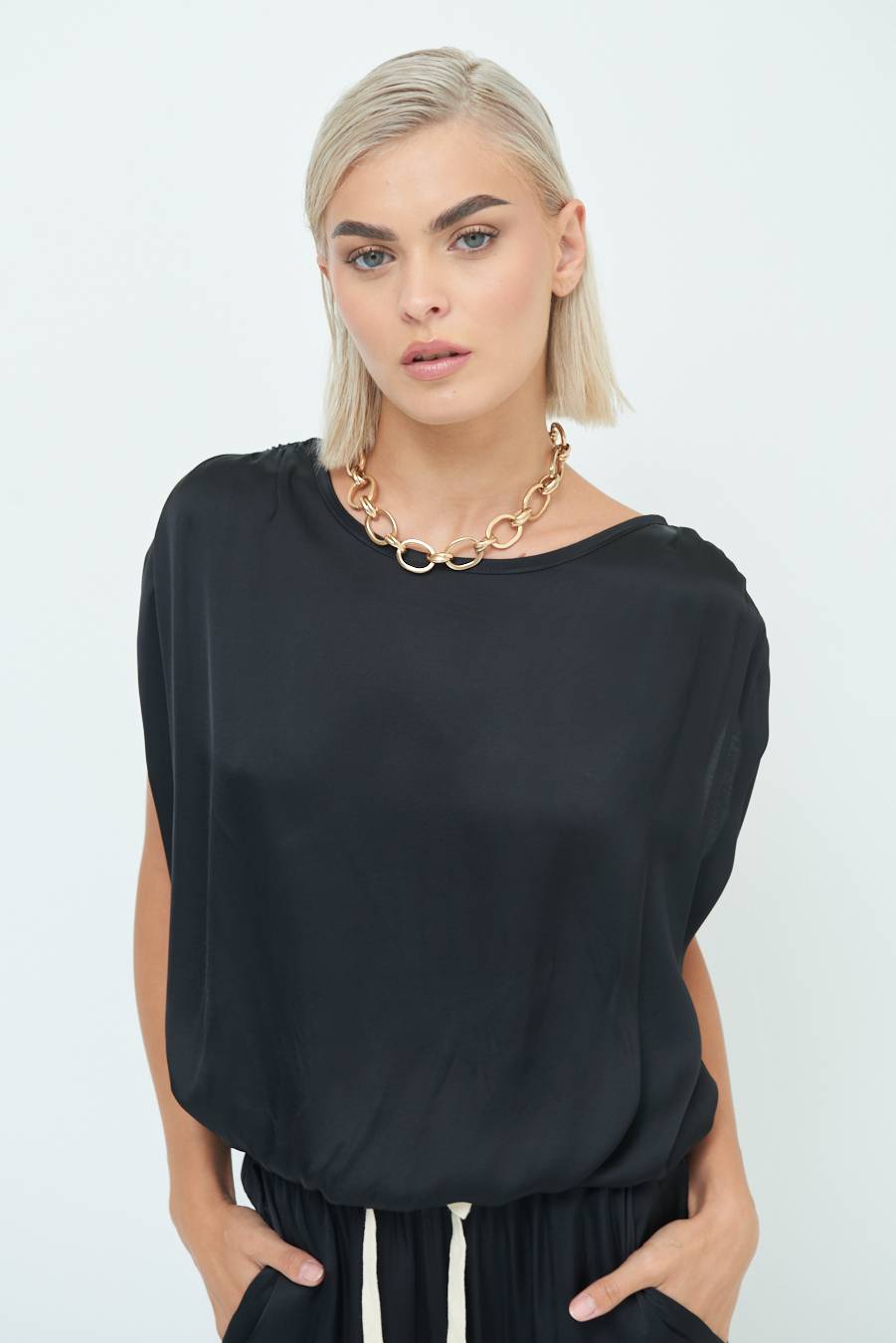 Kikisix TOP CON ELASTICO FONDO SCOLLO BALA NERO In Vendita