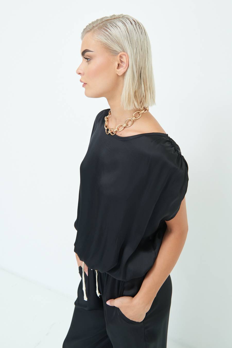 Kikisix TOP CON ELASTICO FONDO SCOLLO BALA NERO In Vendita