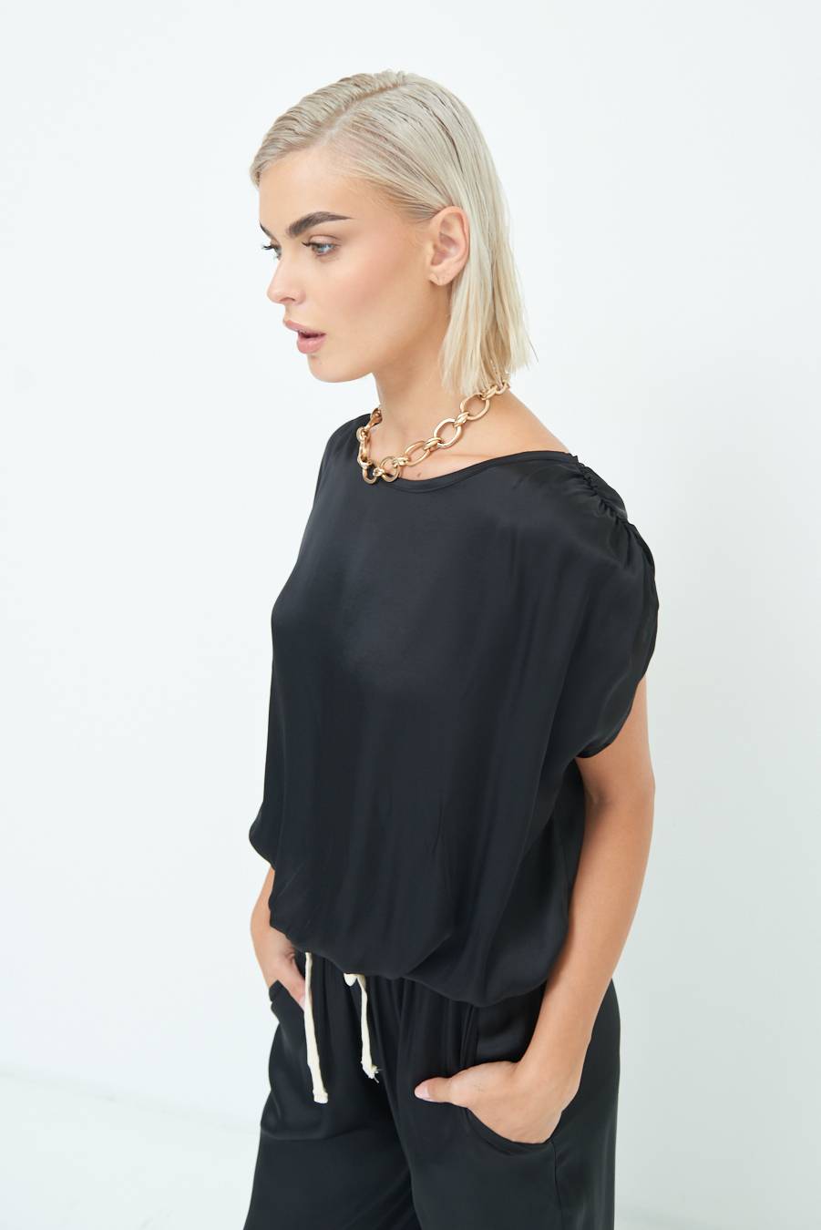 Kikisix TOP CON ELASTICO FONDO SCOLLO BALA NERO In Vendita