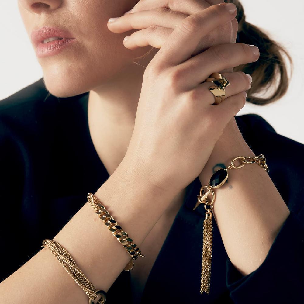 Unoaerre Bracciale catena dorata e pietra nera | UNOAERRE Gioielli Officina